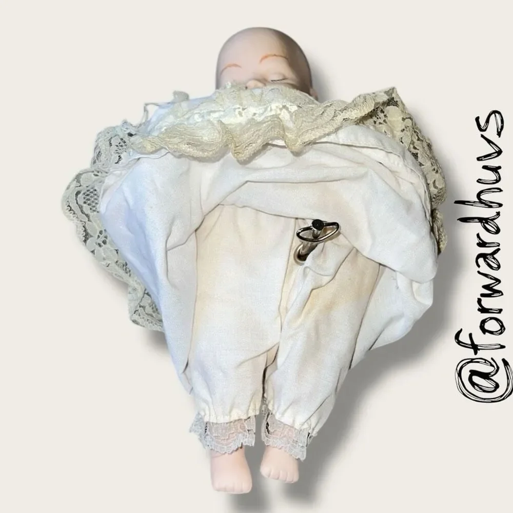 Wind-Up Musical Porcelain Doll – Moving Head & Arms - UNKNOWN AGE